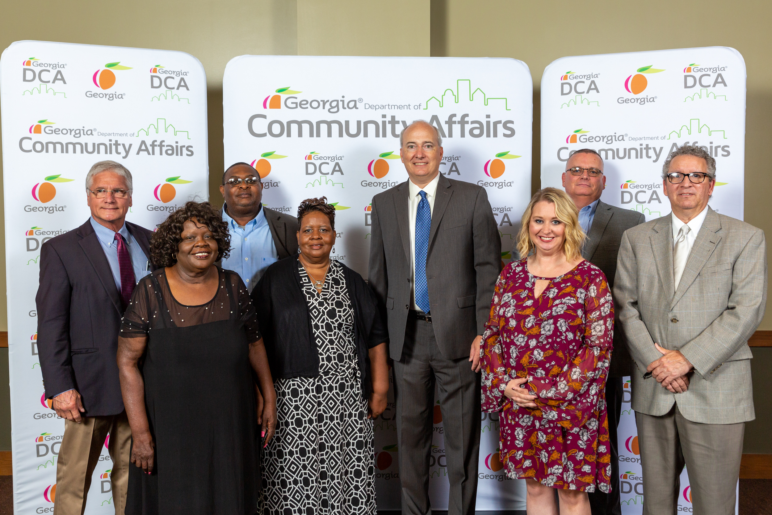 Members of the City of Adel pose with DCA Commissioner Christopher Nunn. Adel received a GA Initiative for Community Housing designation. 